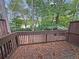 View from the deck surrounded by trees offers a secluded outdoor space at 1190 Se Village Se Ct, Atlanta, GA 30316