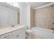 Clean bathroom with tub and shower combination at 7470 Flintlock Way, Alpharetta, GA 30005