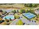 Aerial view showing tennis courts and pool area at 7470 Flintlock Way, Alpharetta, GA 30005