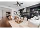 Bright living room with hardwood floors and fireplace at 7470 Flintlock Way, Alpharetta, GA 30005