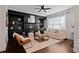 Living room features a fireplace and built in shelving at 7470 Flintlock Way, Alpharetta, GA 30005