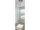 Bedroom with a window and ample natural light at 10922 Wheeler Trce, Hampton, GA 30228