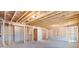 Unfinished basement showing wall and ceiling framework at 41 Bennett Farm Dr, Loganville, GA 30052