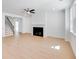 Bright living room with a fireplace, hardwood floors, and ample natural light at 41 Bennett Farm Dr, Loganville, GA 30052