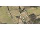 An aerial view of a property showing acreage, boundary lines and surrounding neighborhood at 63 Youth Jersey Rd, Covington, GA 30014