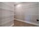 Walk-in closet with multiple wire shelves, providing ample storage space at 63 Youth Jersey Rd, Covington, GA 30014