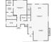 Floor plan depicting the layout of the first floor, including the kitchen, living room, and primary suite at 63 Youth Jersey Rd, Covington, GA 30014