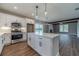 Well-appointed kitchen with a center island, stainless steel appliances, and ample counter space at 63 Youth Jersey Rd, Covington, GA 30014