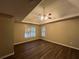 Spacious Primary bedroom with high ceilings and wood flooring at 1824 Thornhill Se Pass, Conyers, GA 30013