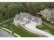 Expansive home featuring a large lawn, a beautiful driveway, and a well-maintained landscape at 11 Brownson Ct, Acworth, GA 30101