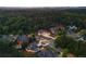 Expansive neighborhood featuring luxury homes nestled amongst mature trees with stunning mountain views in the distance at 11 Brownson Ct, Acworth, GA 30101