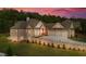 Stunning brick home with a three-car garage and beautifully landscaped yard at 11 Brownson Ct, Acworth, GA 30101
