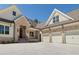 Charming home featuring a brick facade, a three-car garage, and an inviting entrance at 11 Brownson Ct, Acworth, GA 30101