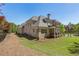 Spacious home with a covered porch and a lush green yard, perfect for outdoor enjoyment at 11 Brownson Ct, Acworth, GA 30101