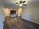 Spacious living room with wood-look floors and kitchen views at 901 Abernathy Ne Rd # 2050, Sandy Springs, GA 30328