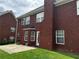 Brick home featuring a spacious backyard, perfect for entertaining and relaxing at 989 Park Knoll Ct, Lawrenceville, GA 30043