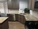 Well-lit kitchen featuring stainless steel appliances and granite countertops at 989 Park Knoll Ct, Lawrenceville, GA 30043