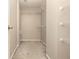 This walk in closet has carpeted floors and wire shelving at 5100 Windsor Forrest Ln, Atlanta, GA 30349