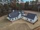 Aerial view of a house showing a large backyard and detached garage at 2259 County Line Rd, Acworth, GA 30101