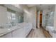 Main bathroom with double vanity, marble countertop and walk-in shower at 2259 County Line Rd, Acworth, GA 30101