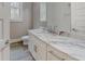 Elegant bathroom features a white vanity with a marble countertop at 2259 County Line Rd, Acworth, GA 30101