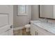 Modern bathroom with white cabinets and marble countertops at 2259 County Line Rd, Acworth, GA 30101