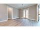 Bright dining room with hardwood floors and French doors at 2259 County Line Rd, Acworth, GA 30101