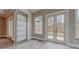 Home office featuring sliding barn door and backyard access at 2259 County Line Rd, Acworth, GA 30101