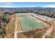 Aerial view of two well-maintained soccer fields with surrounding trees and parking lot at 6640 Benchwood Path, Cumming, GA 30028