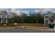 New home construction showing lot, street, and neighboring homes at 6060 Spring Way, Stonecrest, GA 30038