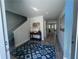 Inviting entryway featuring a decorative rug, wooden floors, and a console table with stylish decor at 3290 Forest Green Dr, Douglasville, GA 30135