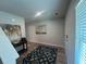 Inviting entryway featuring a decorative rug, wooden floors, and a console table with stylish decor at 3290 Forest Green Dr, Douglasville, GA 30135