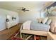 Serene main bedroom with a queen-sized bed, stylish linens, and natural light from the windows at 3290 Forest Green Dr, Douglasville, GA 30135