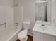 Bright, clean bathroom with tub-shower combination and modern fixtures at 320 Rebecca Lake Way, Fairburn, GA 30213