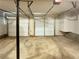 Spacious two car garage with two doors, lots of space and concrete flooring at 320 Rebecca Lake Way, Fairburn, GA 30213