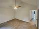 Cozy main bedroom with a ceiling fan and carpeted floors at 320 Rebecca Lake Way, Fairburn, GA 30213