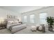 Cozy bedroom with a plush bed, sitting chair, and ample natural light at 2500 Peachtree Nw Rd # 405S, Atlanta, GA 30305