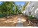 Enjoy the community garden featuring individual plots, planting beds, and an outdoor table with seating at 2500 Peachtree Nw Rd # 405S, Atlanta, GA 30305