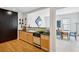 Well-lit kitchen featuring sleek countertops, wooden cabinetry, stainless steel appliances, and hardwood floors at 2500 Peachtree Nw Rd # 405S, Atlanta, GA 30305