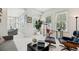Inviting living space with cozy seating, a dedicated workspace, and large windows for ample sunlight at 2500 Peachtree Nw Rd # 405S, Atlanta, GA 30305