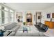 Bright and airy living room with modern furnishings and large windows for natural light at 2500 Peachtree Nw Rd # 405S, Atlanta, GA 30305