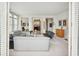 Bright living room boasts neutral walls, modern decor, and an open, airy layout with natural light at 2500 Peachtree Nw Rd # 405S, Atlanta, GA 30305