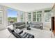 Bright and airy living room with modern furnishings and large windows offering views at 2500 Peachtree Nw Rd # 405S, Atlanta, GA 30305