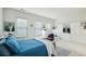 Bright bedroom with three windows, sitting area, and custom shelving, perfect for relaxing at 2500 Peachtree Nw Rd # 405S, Atlanta, GA 30305