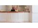 Welcoming reception area with a marble countertop, a friendly attendant, and decorative floral arrangement at 2500 Peachtree Nw Rd # 405S, Atlanta, GA 30305