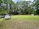 Expansive backyard features a bench swing and plenty of open green space at 3970 Norman Rd, Stone Mountain, GA 30083