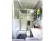 Functional bathroom with a glass-enclosed shower, modern sink, and convenient storage at 3970 Norman Rd, Stone Mountain, GA 30083