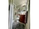 Bathroom features a shower, toilet, cabinet sink and towel and item racks at 3970 Norman Rd, Stone Mountain, GA 30083