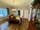 Traditional dining room with a formal table set, wood floors, and natural light at 3970 Norman Rd, Stone Mountain, GA 30083