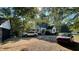 Exterior view of the house and cars parked in the front yard at 3970 Norman Rd, Stone Mountain, GA 30083